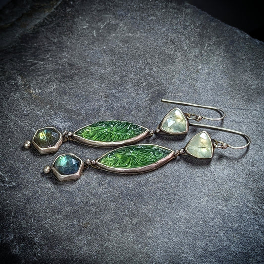 Carved serpentine, labradorite, and prehnite artisan statement earrings.