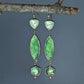 Carved serpentine, labradorite, and prehnite artisan statement earrings.
