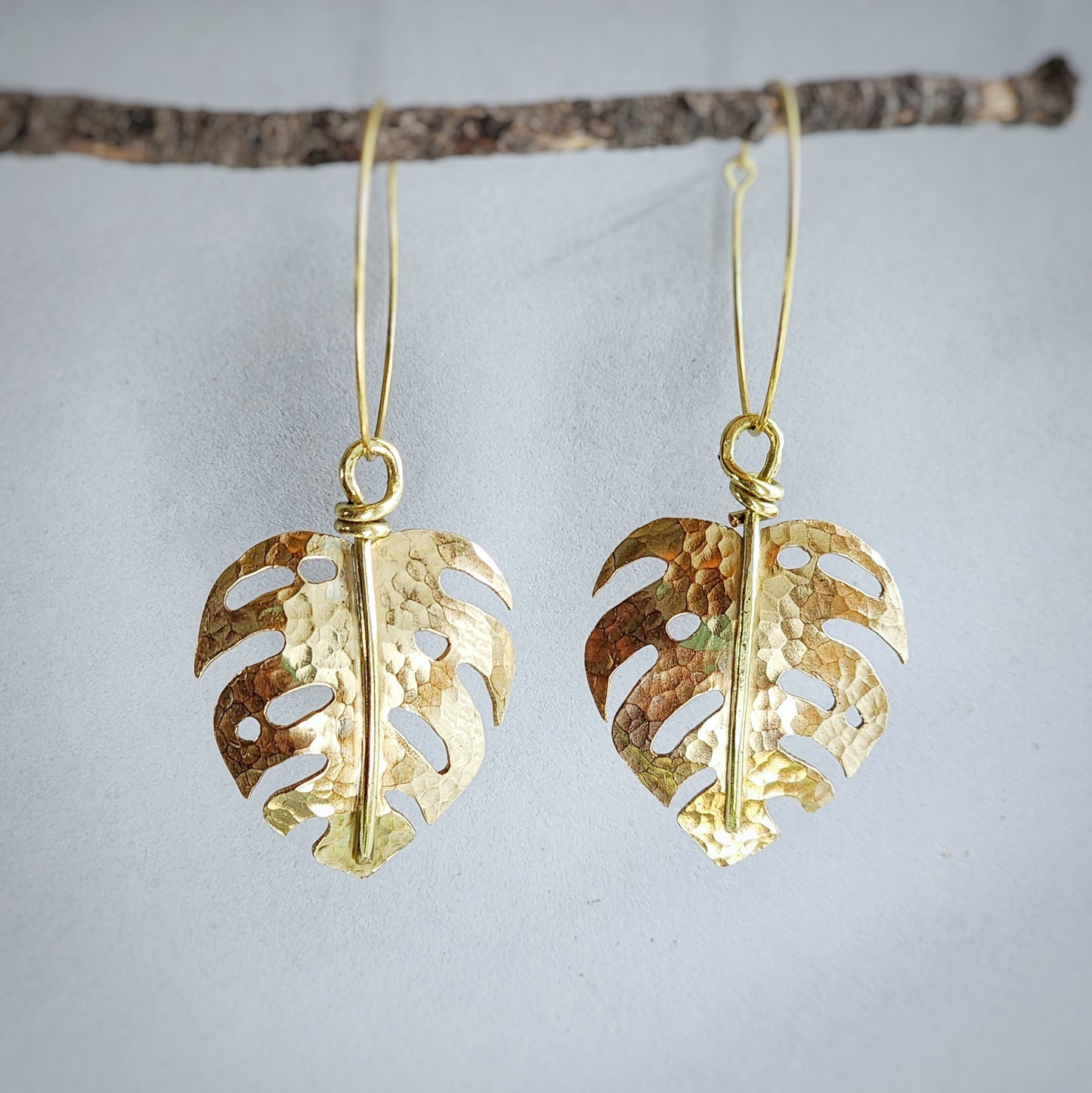 Hand-sawn shiny hammered brass monstera earrings, made to order