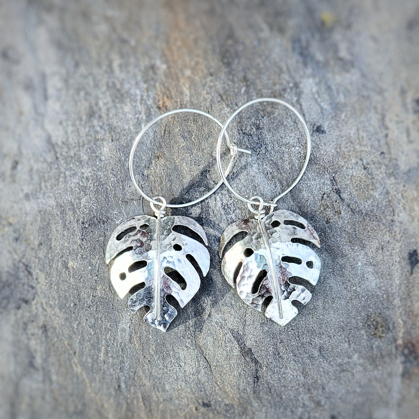 Hand-sawn shiny hammered solid sterling silver monstera earrings, made to order